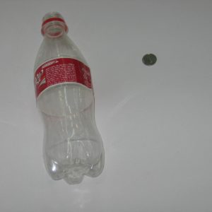 מטבע נכנס לתוך קולה סגור 144